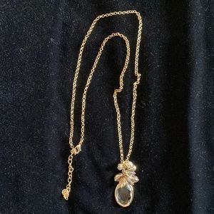 Faux, gold, and crystal necklace